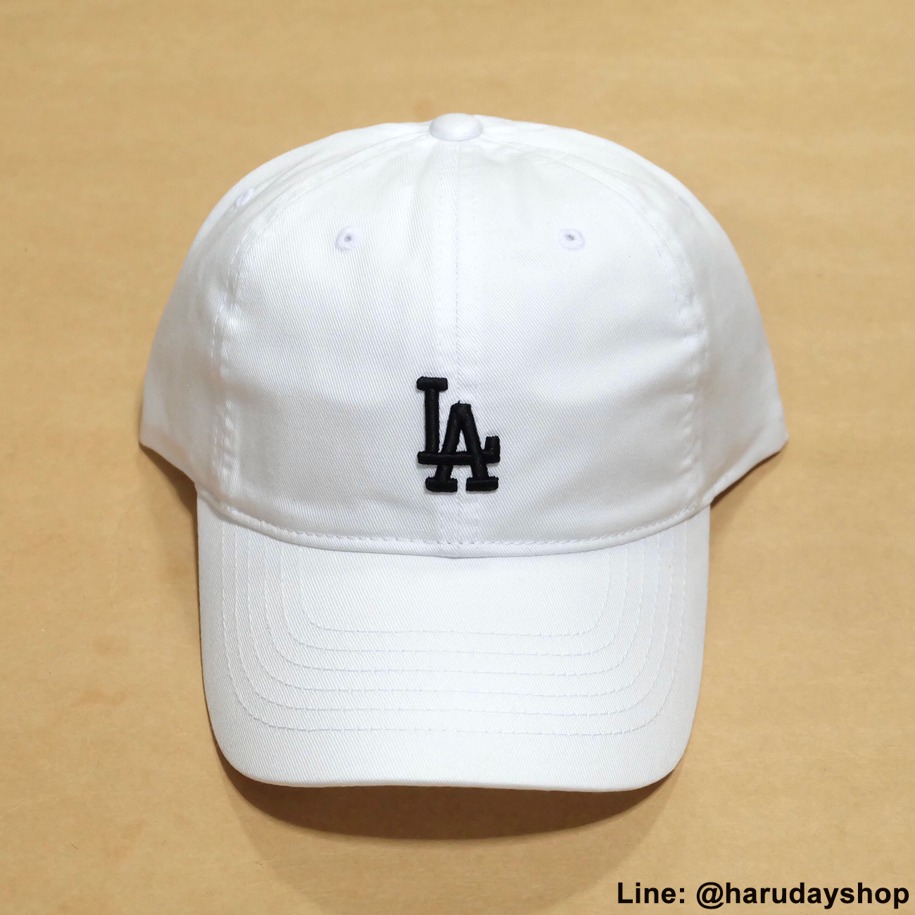 หมวก LA แบรนด์ MLB KOREA สีขาวปักดำ โลโก้เล็ก